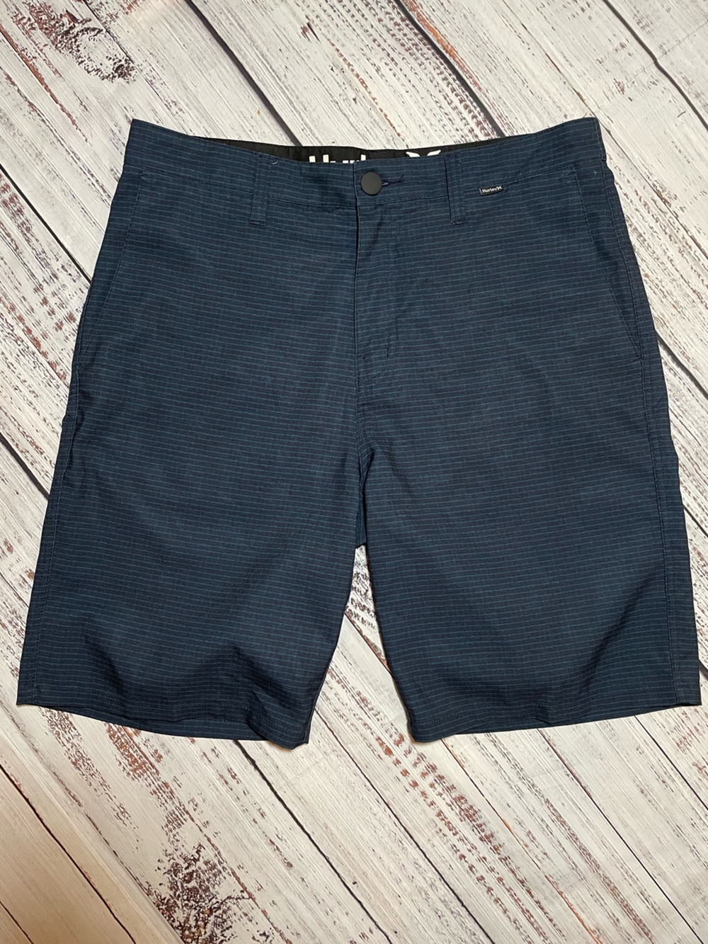 Hurley dark navy blue pinstriped hybrid walk shorts. Size 31.
